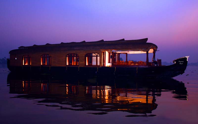 Kannur Houseboat Day and Night Cruise with family enjoying backwater views and overnight stay near Parassinikadavu
